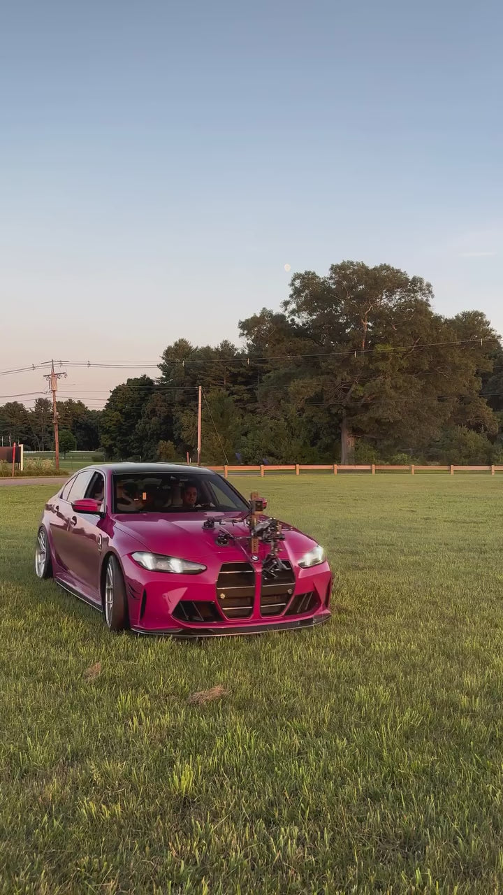 Load video: Deep Patel's RubyStar BMW G80 M3 camera car with CarbonXtreme steering wheel