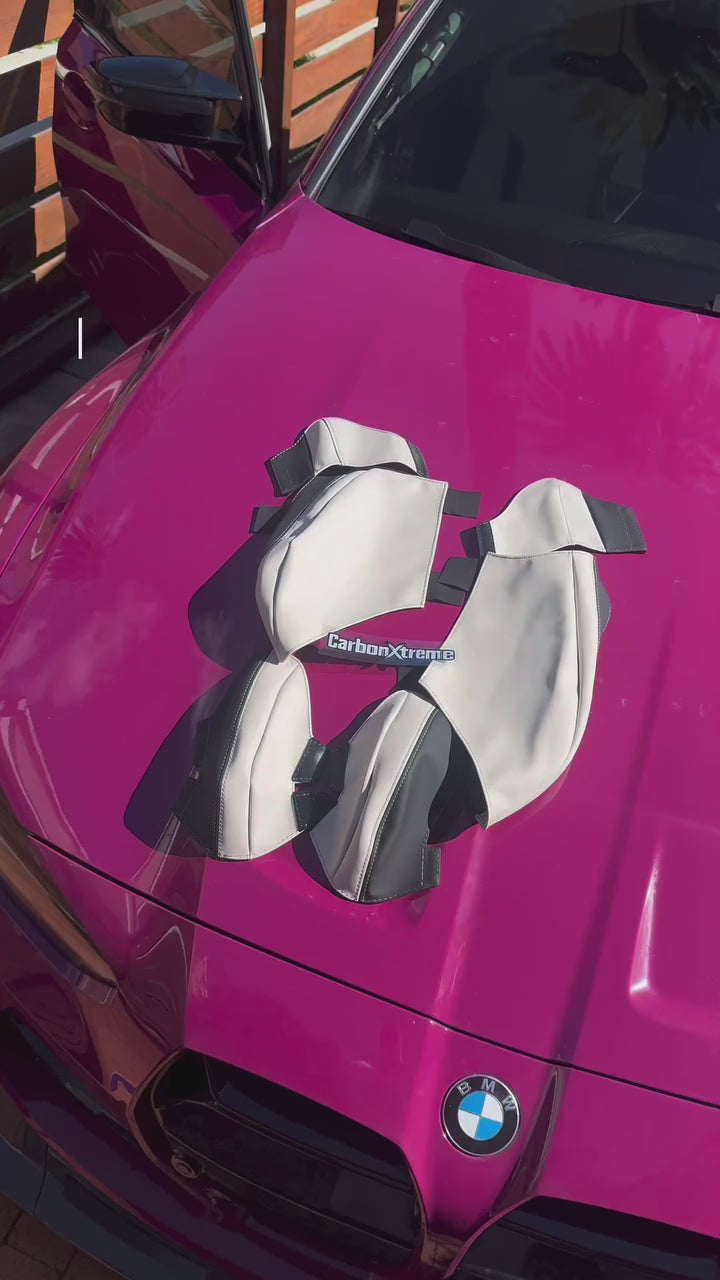 Load video: M3BBL installing CarbonXtreme seat protectors on ivory carbon buckets