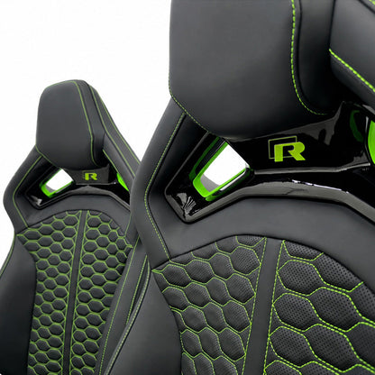 VW bucket seat shoulder bridge detail, gloss black trim with green accent inserts and R badge