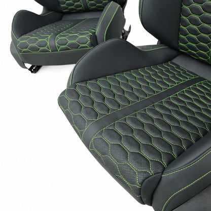 VW carbon bucket seat cushions with perforated black leather and green honeycomb quilting, driver and passenger pair