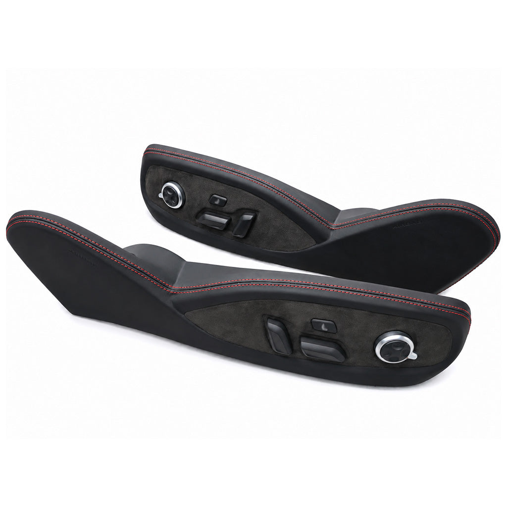 Pair of seat side trim panels wrapped in leather and Alcantara with red contrast stitching, factory seat adjustment switches and memory dial in place